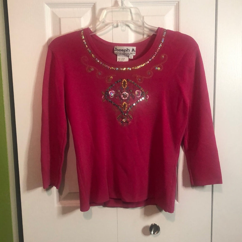 Dressy top with front sequins design in front very good condition